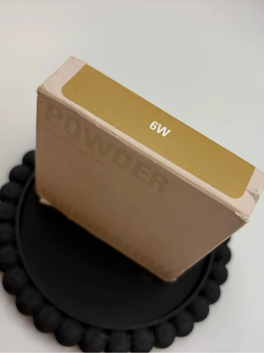 Kylie Cosmetics Powder Foundation in shade 6W
